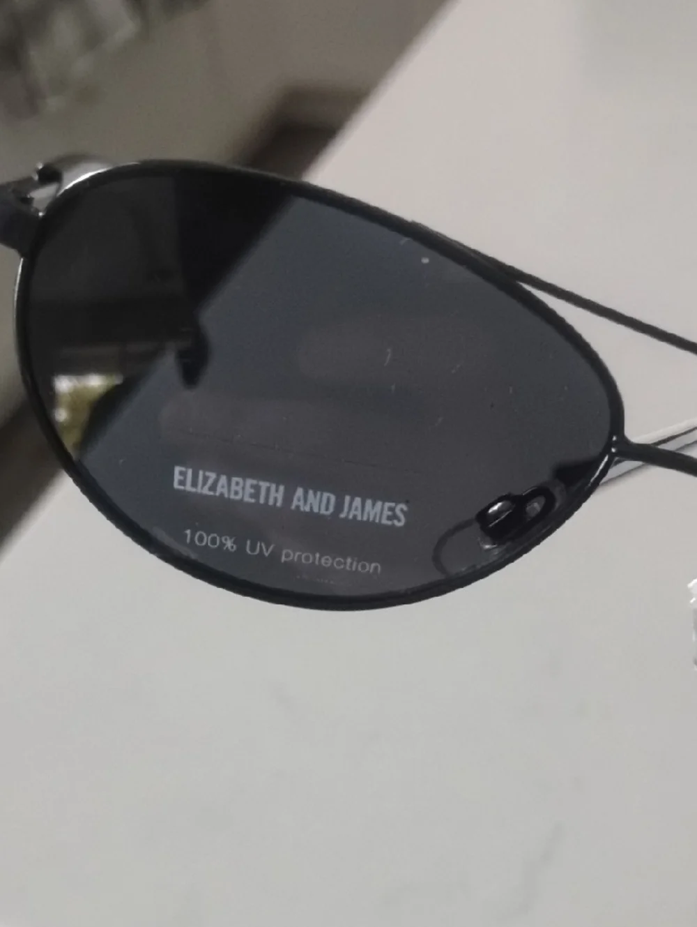 Elizabeth and James Black Slim Oval Sunglasses - Picture 6 of 12